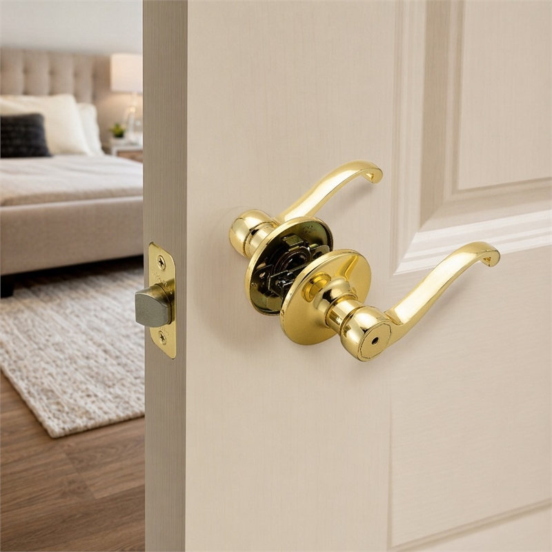 Pemberly Row Scroll Privacy Door Handle in Polished Brass