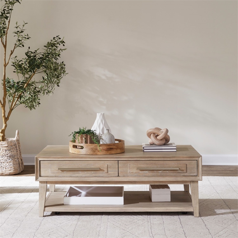 Pemberly Row Cocktail Table with 2 Drawers and Casters in Brown