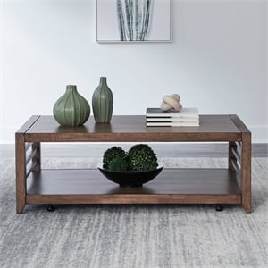 Pemberly Row Cocktail Table with Picture Frame Styling and Casters in Brown