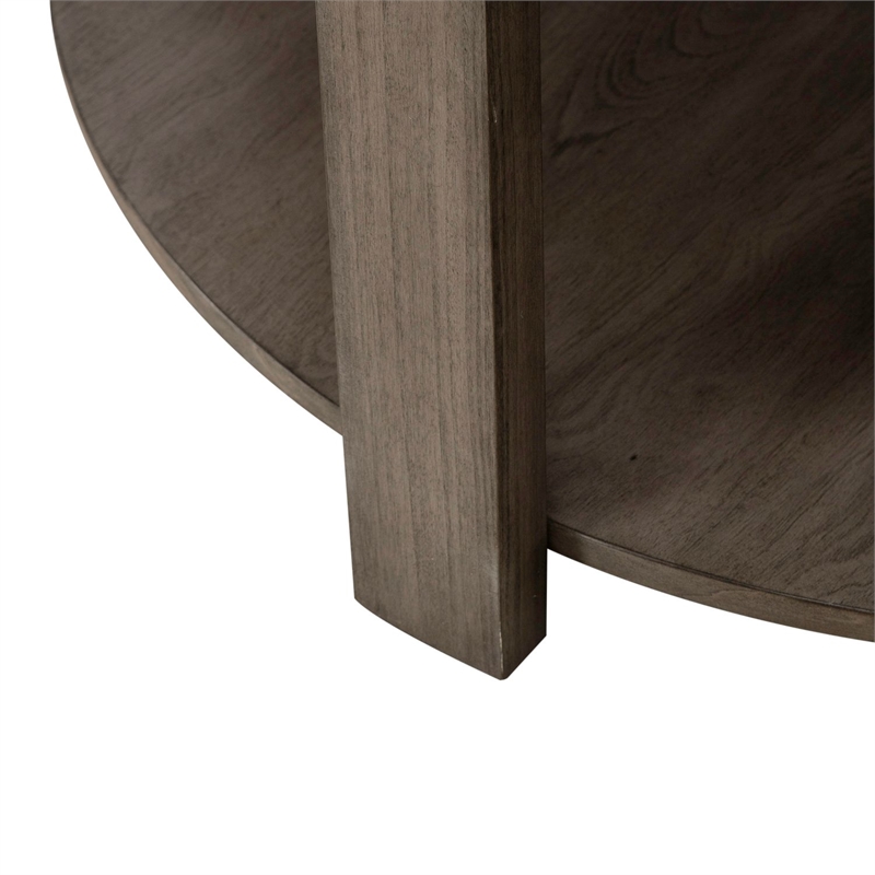 Pemberly Row Cocktail Table with Inset Wood Top and Casters in Brown