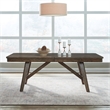 Pemberly Row Trestle Dining Table with 20 Inch Self Storing Leaf in Brown