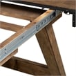 Pemberly Row Trestle Dining Table with 20 Inch Self Storing Leaf in Brown