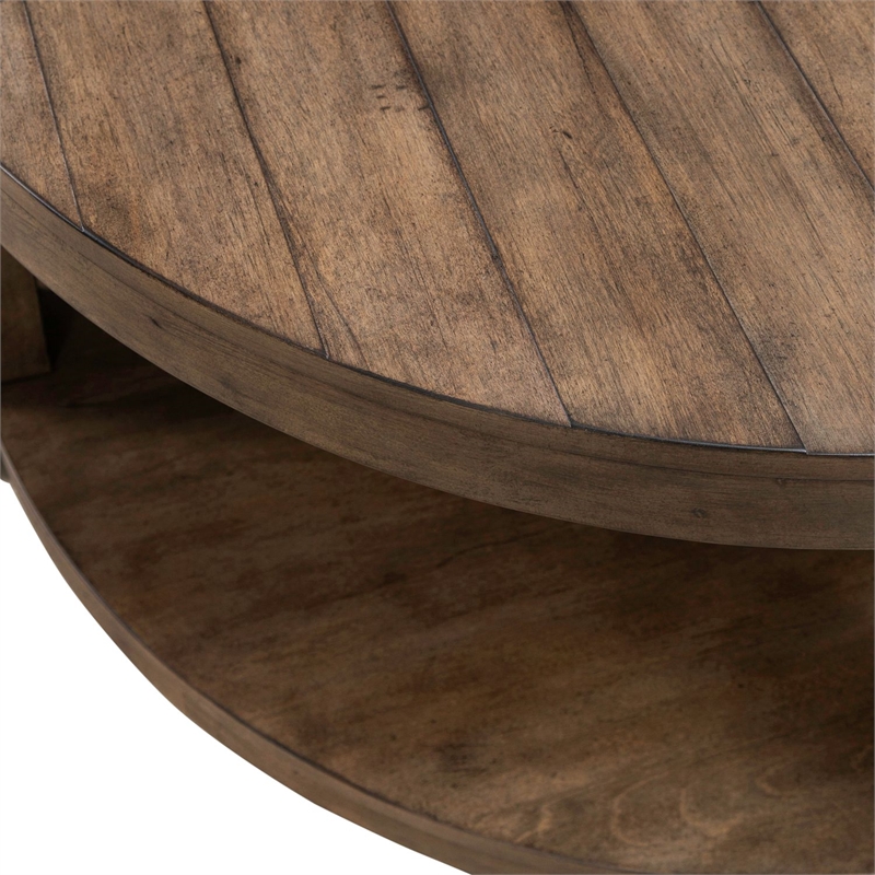 Pemberly Row Round Cocktail Table with Casters and Planked Top in Brown
