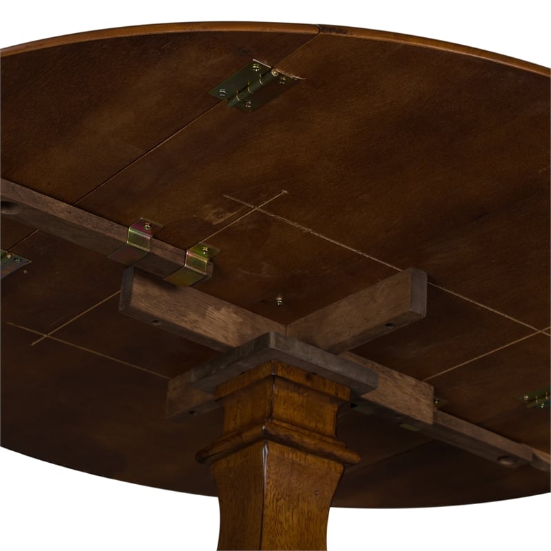 Pemberly Row Drop Leaf Pedestal Dining Table in Tobacco Wood