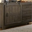 Pemberly Row Full Bookcase Bed with Sliding Door Dresser and Mirror in Brown