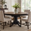 Pemberly Row Black Pedestal Table Set with Butterfly Leaf and Spindle Chairs