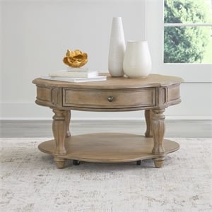 Pemberly Row Round Cocktail Table with Casters in Weathered Bisque