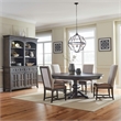 Pemberly Row 5 Piece Pedestal Table Set with Upholstered Chairs in Brown
