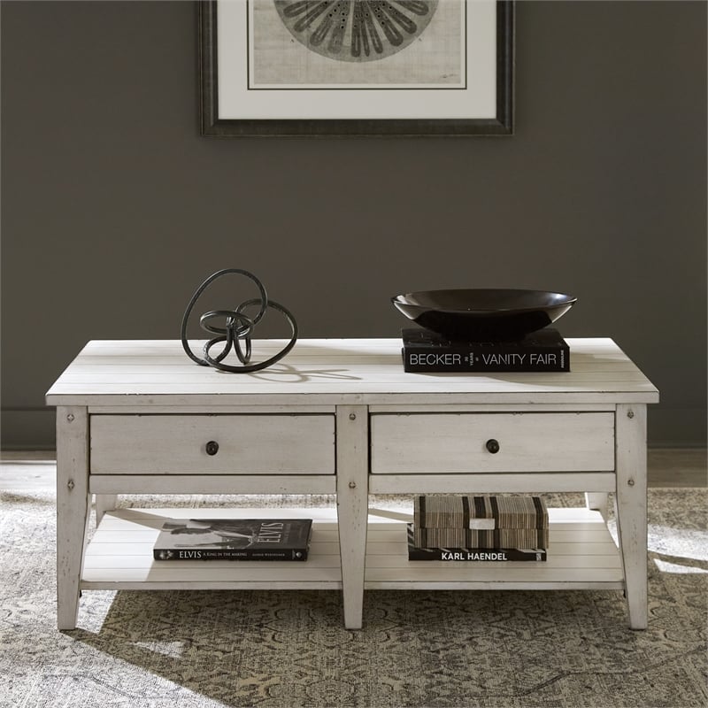 Pemberly Row Cocktail Table with Push-Through Drawers in Weathered White Finish