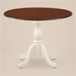 Pemberly Row Round Rubberwood Dining Table in Mahogany Finish
