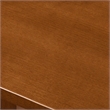 Pemberly Row Rectangular Extendable Wood Dining Table in Saddle Brown Finish