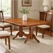 Pemberly Row Napoleon Wood Dining Table in Saddle Brown