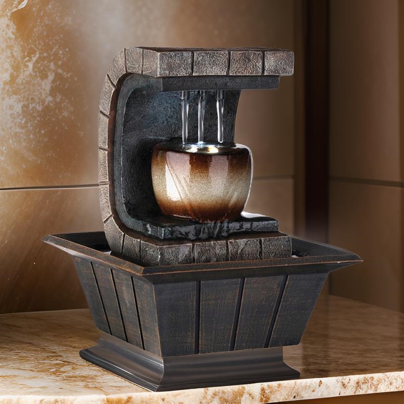 Pemberly Row C Shaped Polyresin 3 Pillar Fountain with LED Lights in Brown
