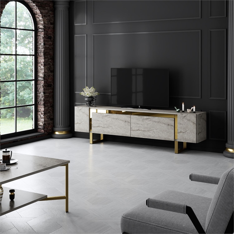 Pemberly Row TV Stand in Travertine and Gold with Metal Legs