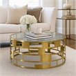 Pemberly Row Round Glass Coffee Table with Brushed Stainless Steel Base in Gold