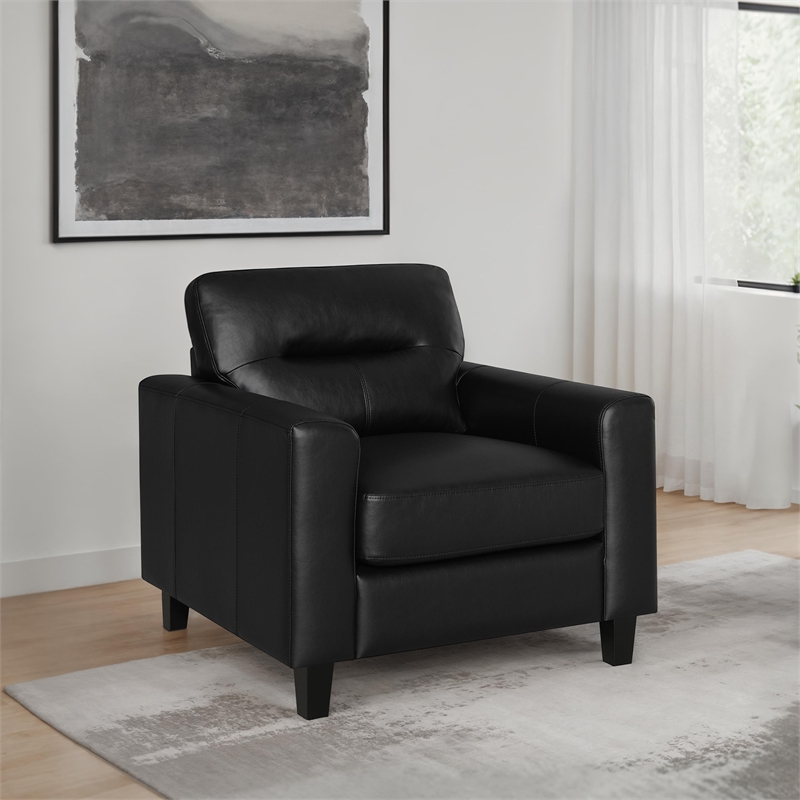 Pemberly Row Faux Leather Upholstered Track Arm Chair in Black