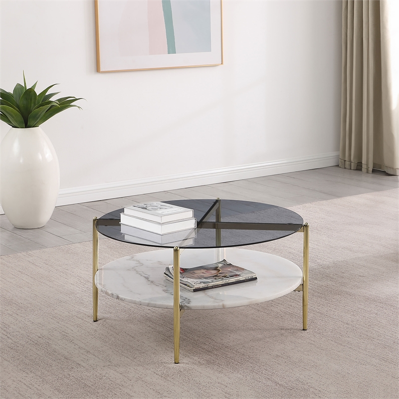 Pemberly Row Round Glass Top Coffee Table with White Marble Shelf in Gold