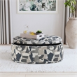 Pemberly Row Oval Upholstered Storage Ottoman in Indigo Blue