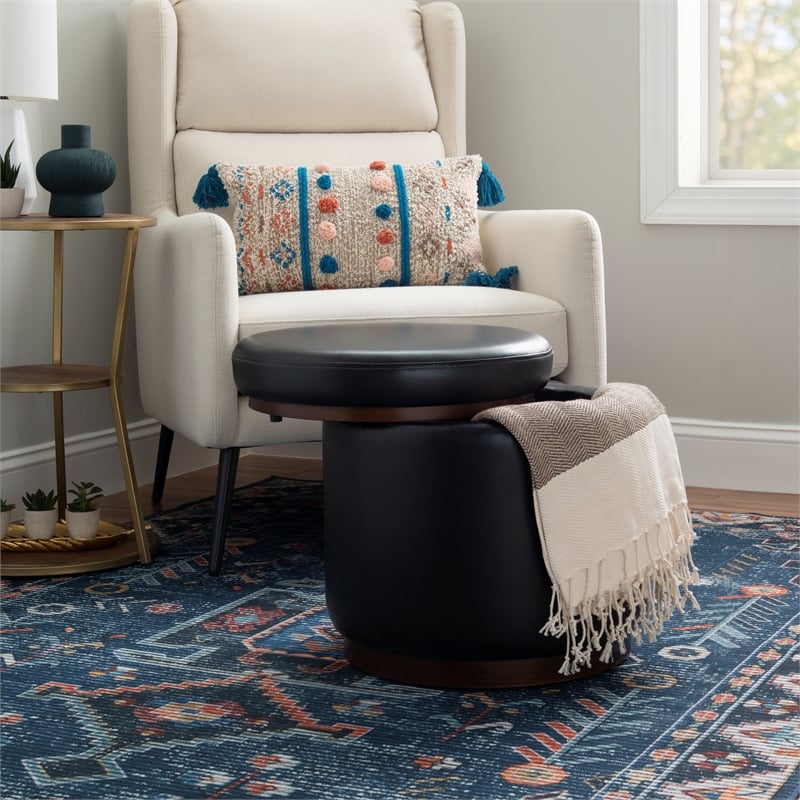 Pemberly Row Round Storage Ottoman in Black Faux Leather with Wood Trim