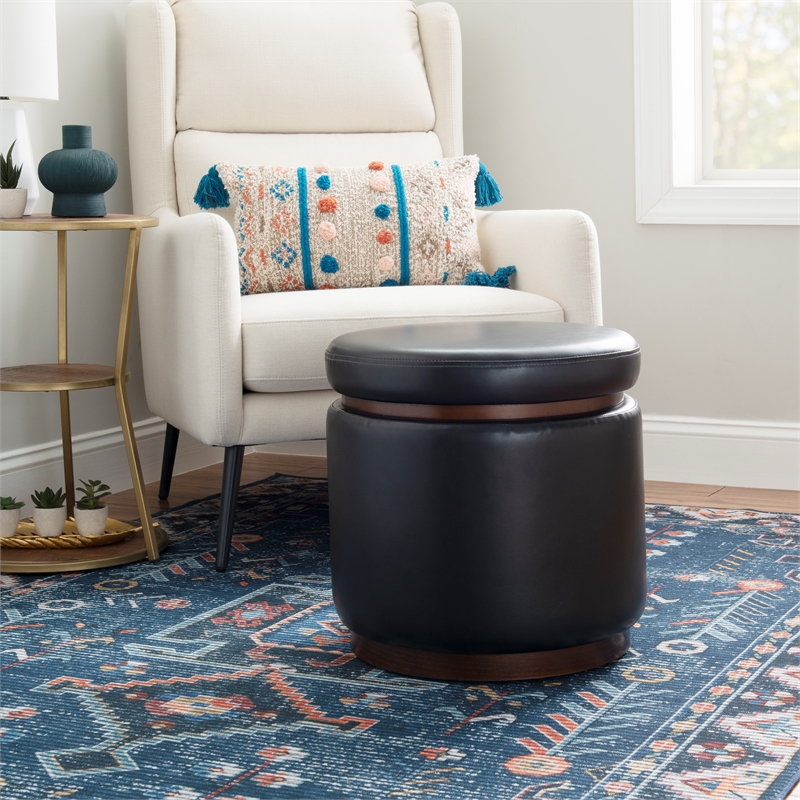 Pemberly Row Round Storage Ottoman in Black Faux Leather with Wood Trim