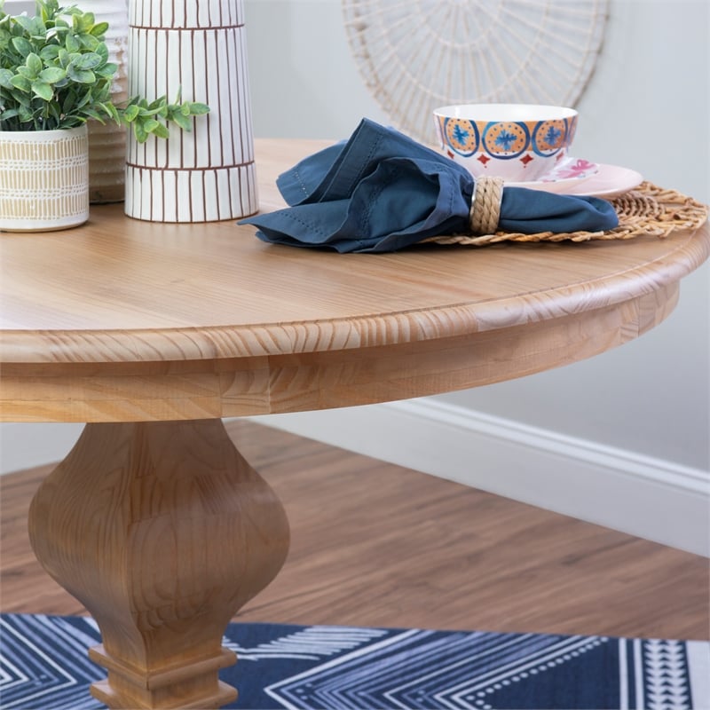 Pemberly Row Round Pine Pedestal Dining Table in Rustic Honey Finish