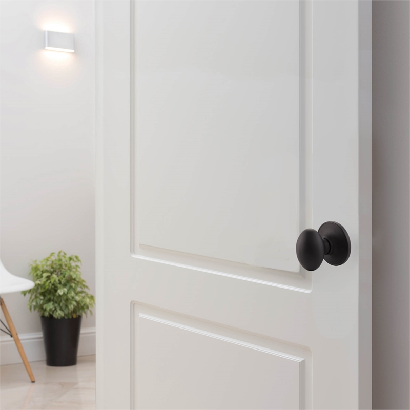 Pemberly Row Egg Brass Dummy Door Knob in Matte Black Finish
