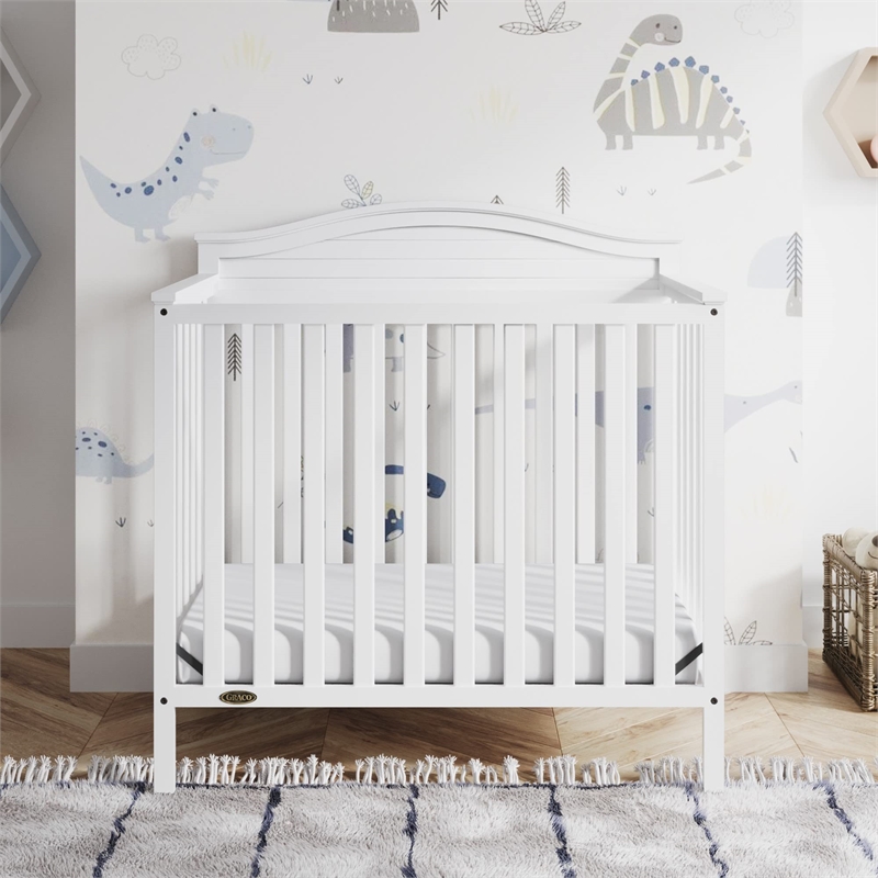 Stork Craft USA Graco Stella Wood 4-in-1 Convertible Mini Crib in White