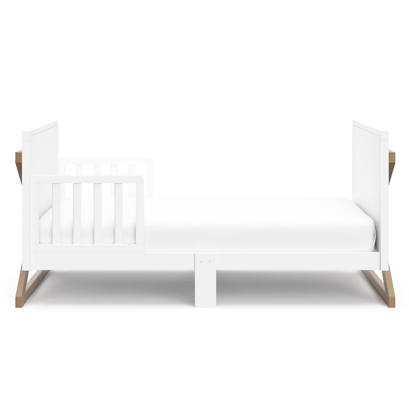 Stork Craft USA Equinox Wood Toddler Bed with Guardrails in White/Driftwood