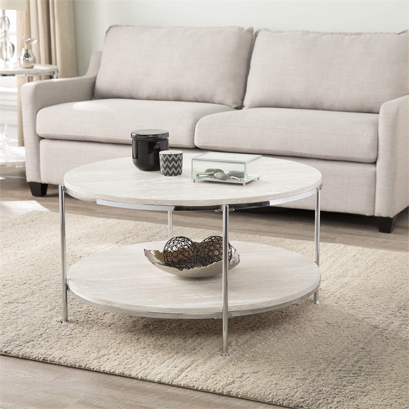 Maklaine Transitional Round Faux Travertine Stone Cocktail Table in Chrome
