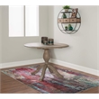 Maklaine Round Drop Leaf Pedestal Dining Table in Rustic Gray Washed Wood
