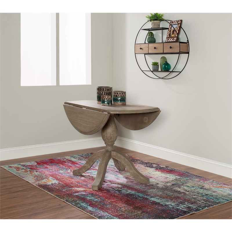 Maklaine Round Drop Leaf Pedestal Dining Table in Rustic Gray Washed Wood