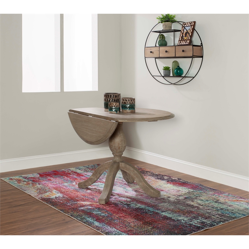 Maklaine Round Drop Leaf Pedestal Dining Table in Rustic Gray Washed Wood
