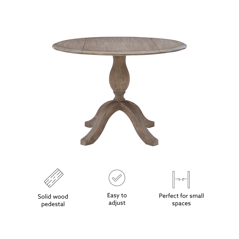 Maklaine Round Drop Leaf Pedestal Dining Table in Rustic Gray Washed Wood
