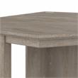 Maklaine Farmhouse Engineered Wood Small Corner Desk in Washed Gray