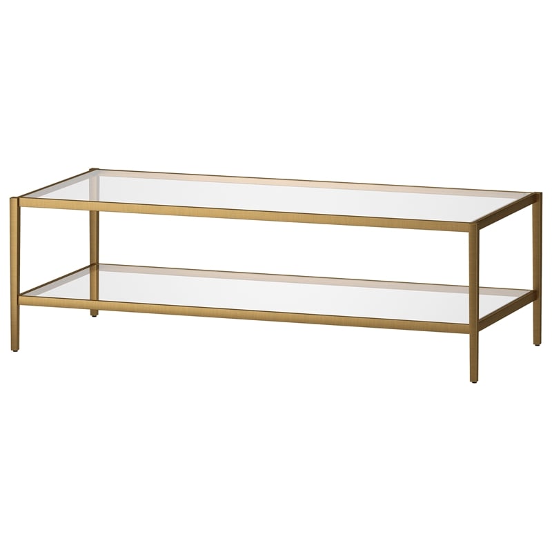Henn&Hart 54 in. Antique Brass Finish Coffee Table with Clear Glass Shelf