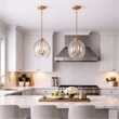 Nezth 5-Light Clear Glass Pendant with Satin Brass Finish