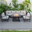 LeisureMod Chelsea 7-Piece Sectional And Fire Pit Table With Cushions in Beige