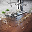 LeisureMod Lawrence Acrylic Folding Chair in Gold Metal Frame/Tangerine