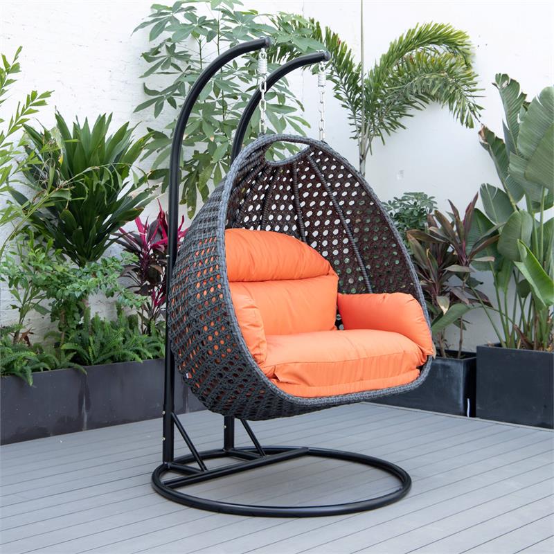 LeisureMod Mendoza Charcoal Wicker Patio Double Swing Chair in Orange
