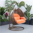 LeisureMod Mendoza Dark Brown Wicker Patio Double Swing Chair in Orange