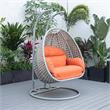 LeisureMod Mendoza Light Gray Wicker Patio Double Swing Chair in Orange