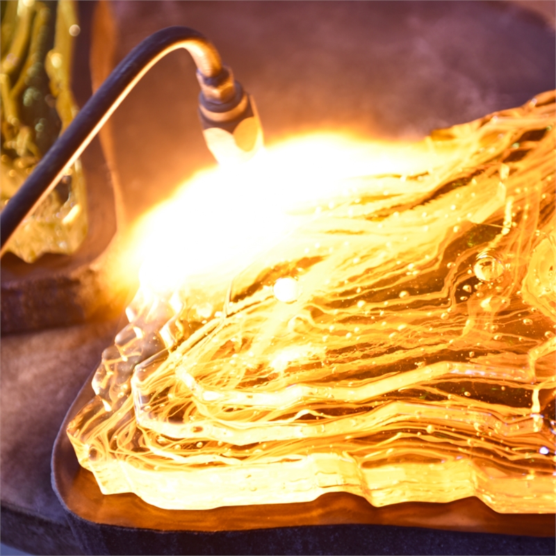 Arcus Integrated LED 70in Brass Chandelier with Handcrafted Glass