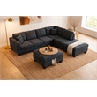 Essa Charcoal Reversible Sectional With USB Power Wood Legs And Storage Ottoman
