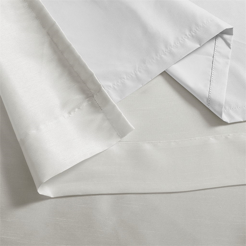 Madison Park Emilia Twist Tab Total Blackout Window Curtain in White 50x84