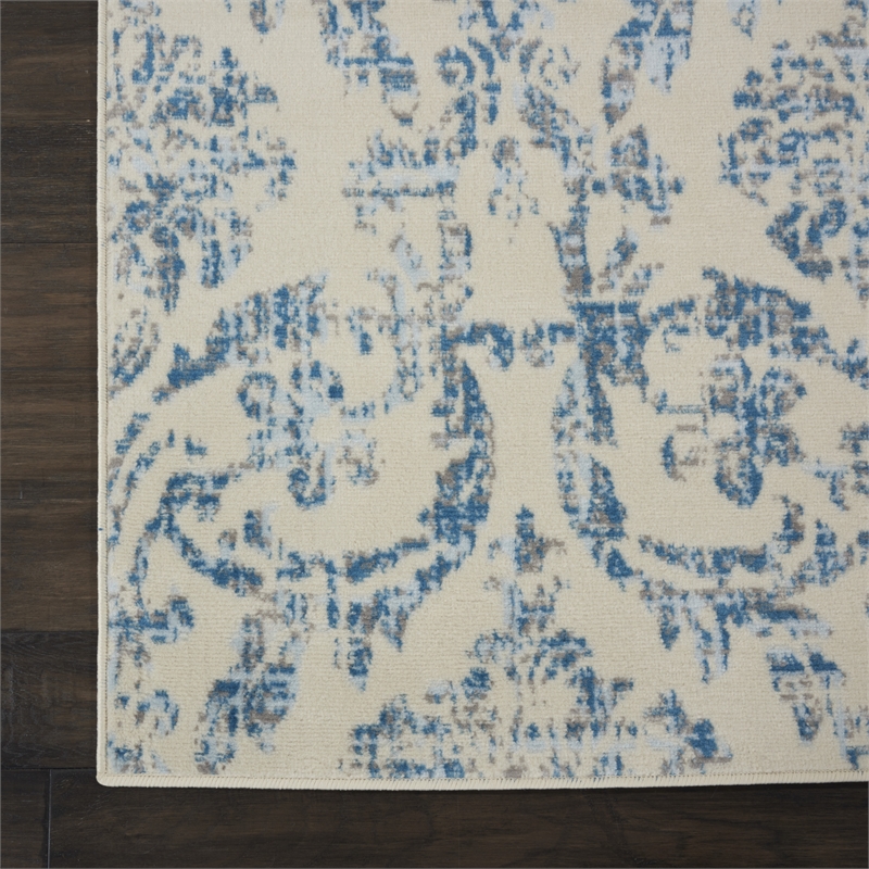 Nourison Jubilant 7' x 10' Ivory/Blue Vintage Indoor Rug Polypropylene