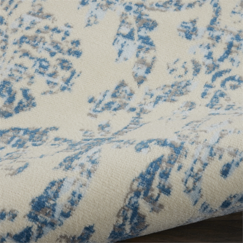 Nourison Jubilant 7' x 10' Ivory/Blue Vintage Indoor Rug Polypropylene