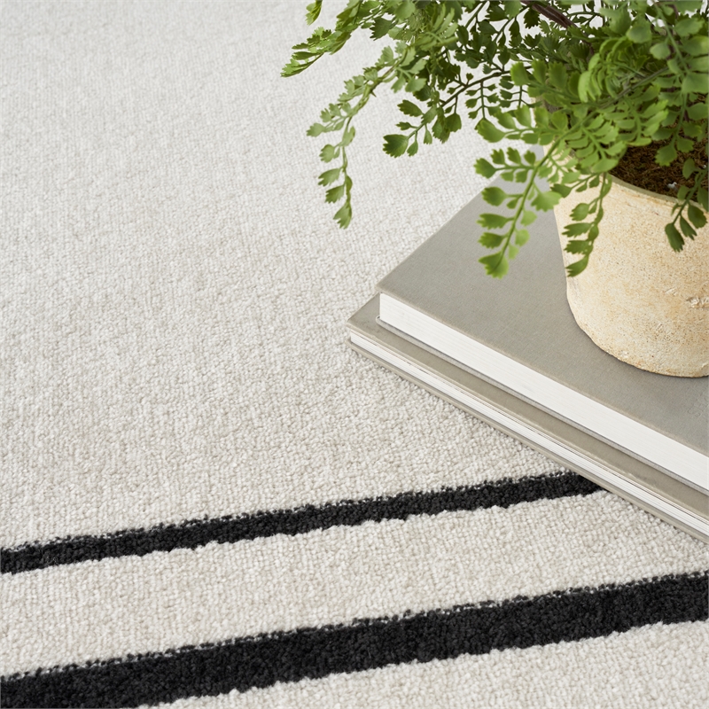Nourison Essentials 6' x 9' Ivory Black Fabric Contemporary Area Rug (6' x 9')
