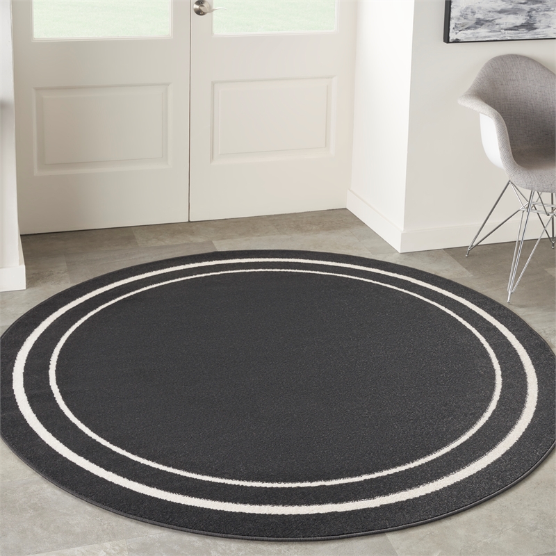 Nourison Essentials 6' x round Black Ivory Contemporary Indoor/Outdoor Rug