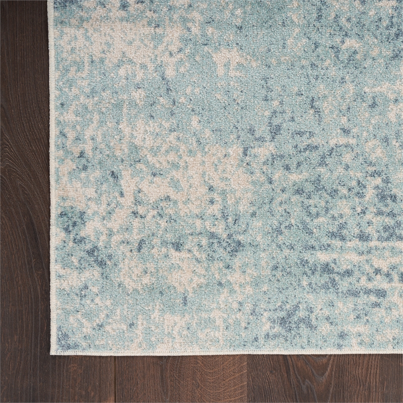 Nourison Astra Machine Washable 9' x 12' Polyester Indoor Rug in Blue Ivory