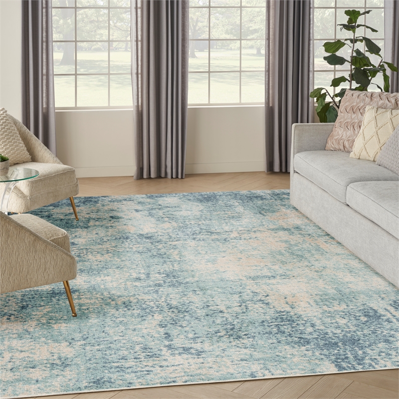Nourison Astra Machine Washable 9' x 12' Polyester Indoor Rug in Blue Ivory